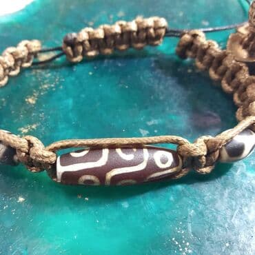 в единственнои экземпляре: Бусины Дзи – талисман, происхождение которого связывают с — 4