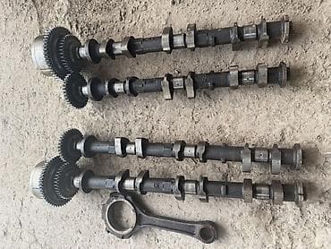 Кыймылдаткыч тетиктери жана чогултулган моторлор: Бөлүштүргүч вал Nissan 2005 г., Колдонулган, Оригинал, АКШ — 2