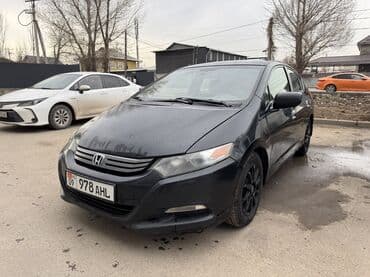 диска колеса: Honda Insight: 2010 г., 1.3 л, Гибрид, Хэтчбэк — 1