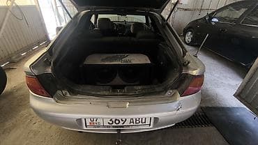 honda fit на рассрочку: Mazda 323: 1996 г., 1.8 л, Механика, Бензин, Хэтчбэк — 3