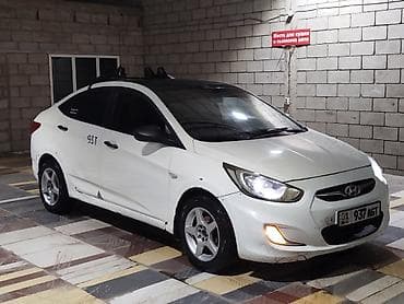 вложений: Hyundai Solaris: 2011 г., 1.4 л, Механика, Газ, Седан — 1