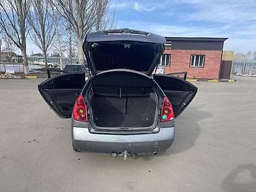 bmb e34: Nissan Primera: 2002 г., Бензин, Седан — 8