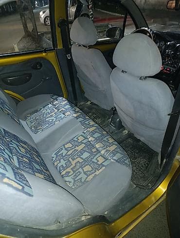 машина с 4: Daewoo Matiz: 2002 г., Механика, Бензин, Хэтчбэк — 5