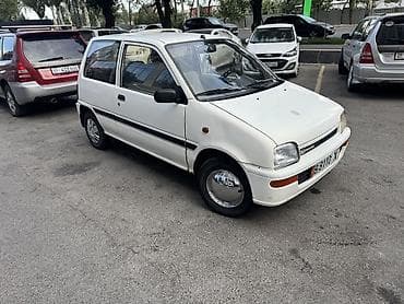 дайхатцу куаре: Daihatsu Cuore: 1994 г., 0.8 л, Механика, Бензин, Универсал — 1