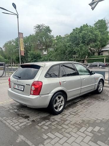 ваз 2141: Mazda 323: 2002 г., 1.6 л, Механика, Бензин, Универсал — 4