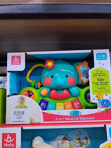 Музыкальная развивающая игрушка Hola “2‑в‑1 Musical Elephant”. -