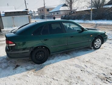 б у авто: Mazda 626: 1998 г., 1.8 л, Механика, Бензин, Хэтчбэк — 5