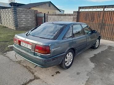 transporter multivan: Mazda 626: 1991 г., 0.2 л, Механика, Бензин, Хэтчбэк — 9