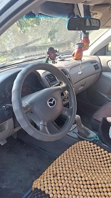 Mazda 626: 2000 г., 1.8 л, Кол менен иштөөчү, Бензин, Хетчбек — 4