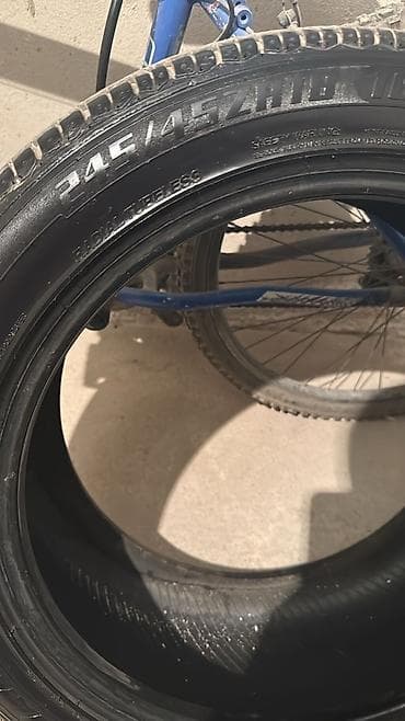 старые шины: Комплект автомобильных шин (4 шт.) - Размер: 245/45 ZR18 - Тип — 2