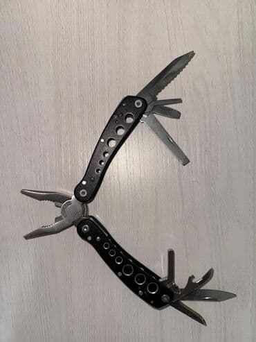 Музыкальные инструменты: Мультитулы и швейцарские ножи (набор) 1) Красный швейцарский нож — 3