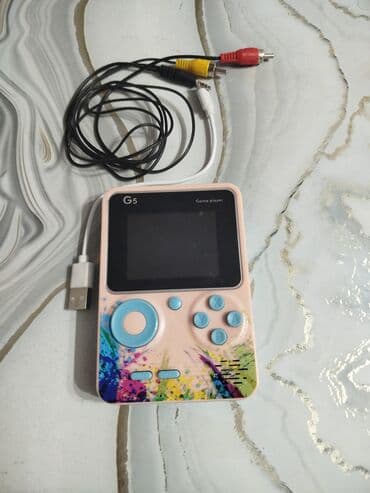 игровой консоль: Портативная игровая приставка G5 - Экран: цветной, показывает меню с — 1