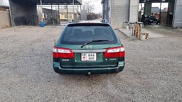 Транспорт: Mazda Capella: 2000 г., 2 л, Механика, Бензин, Универсал — 2