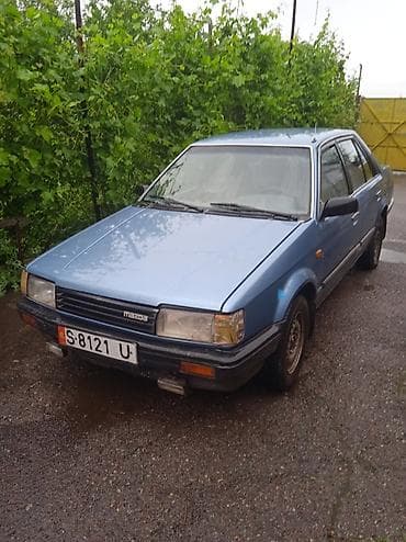 распредвал м54: Mazda 323: 1987 г., 1.5 л, Механика, Бензин, Седан — 2