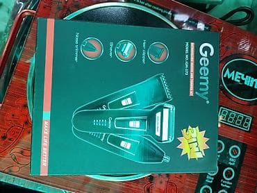 mini shaver: Многофункциональный набор для ухода Geemy 3 в 1, модель GM-573 — 1