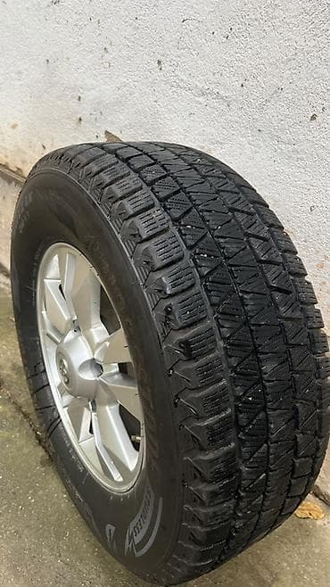 Унаа: Зимнее колесо в сборе: шина Bridgestone Blizzak DM‑V3 на литом диске — 1