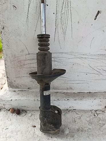 step wgn: Передний амортизатор Honda Оригинал — 1