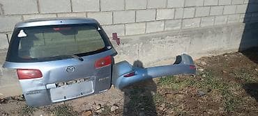 Бампер Mazda, Б/у, Оригинал