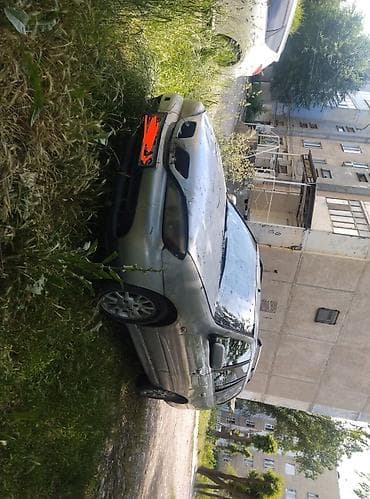 портер капот: Nissan Primera: 2001 г., 1.8 л, Универсал — 5