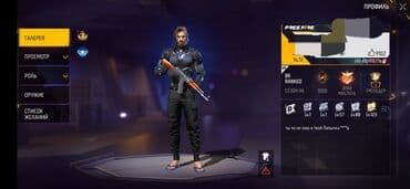 пижама кигуруми детская: Игровой персонаж из Free Fire в черном костюме с синими элементами — 4
