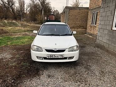 daf 75: Mazda 323: 1999 г., 1.9 л, Автомат, Дизель, Седан — 5