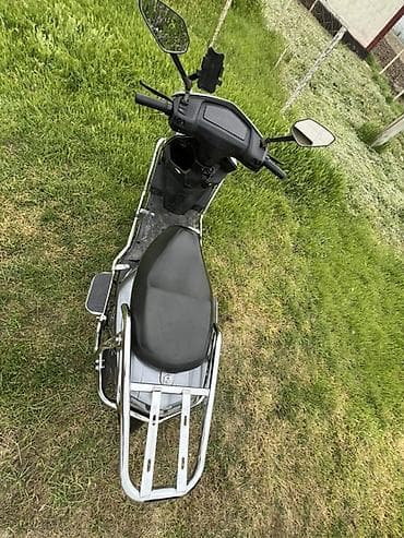 Скутер Skymarx 11, серый цвет. Особенности и оснащение: - Двигатель — 9