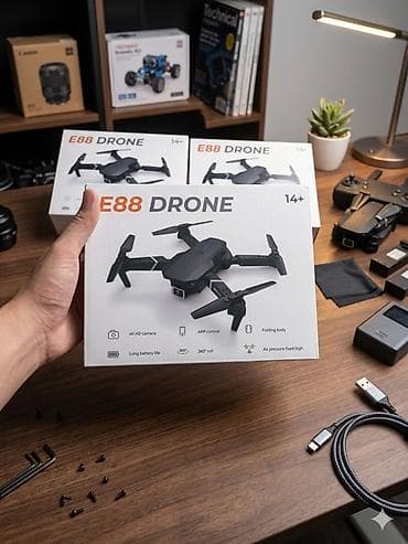 квадрокоптор: Детский Квадрокоптер E88 Drone Особенности: - Складная конструкция — 1