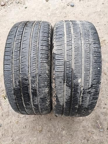 titan diski: Шины 275 / 45 / R 21, Всесезонная, Пара, Внедорожные (АТ/МТ), Pirelli — 1