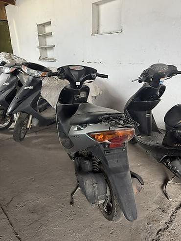 корейские мотоциклы: Тип скутера Honda, 50 куб. см, Бензин — 2