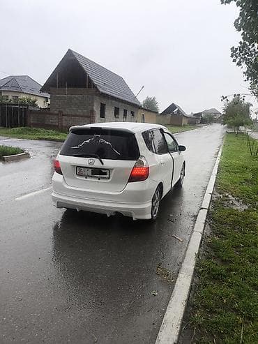 капот одисей: Honda Fit: 2004 г., Универсал — 3