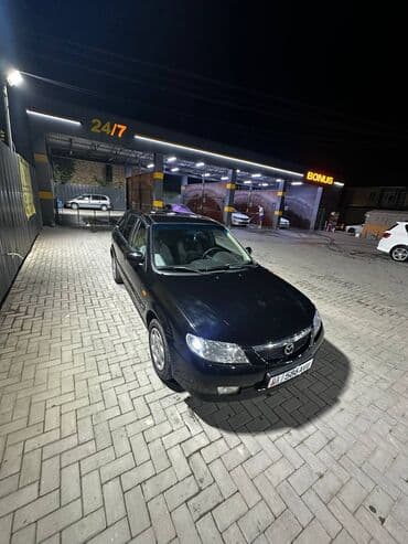 полик нексия 2: Mazda 323: 2001 г., 1.6 л, Механика, Бензиновая, Седан — 3