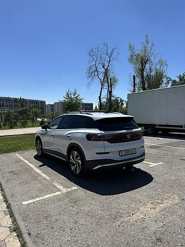круг от прицепа: Volkswagen ID.6: 2022 г., Электромобиль, Кроссовер — 5