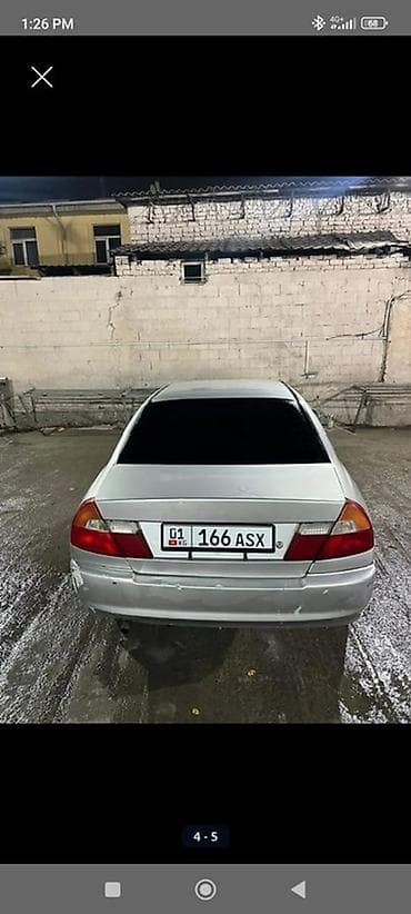 devo matiz: Седан серебристого цвета. Кузов 4-дверный, тонированные стекла. Белые — 3