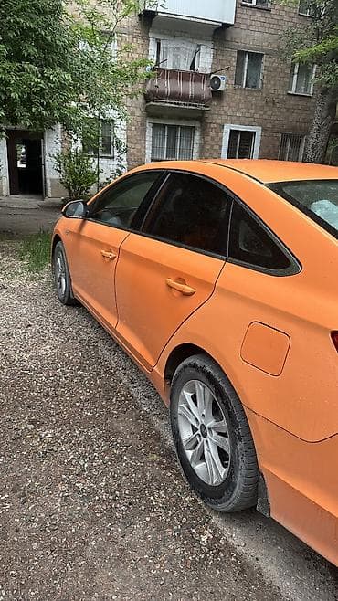 гранат на ауди: Яркий оранжевый седан с динамичным силуэтом и выразительной оптикой — 3