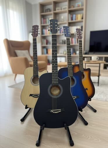 гитара для начинающих: Гитара с комплектом 38 здюймов.Новая. Звук очень приятный. В — 1