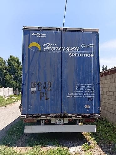 тракторный притцеп: Тентованный полуприцеп Krone (еврофура) 3 оси заводское ленивец 2010 — 7