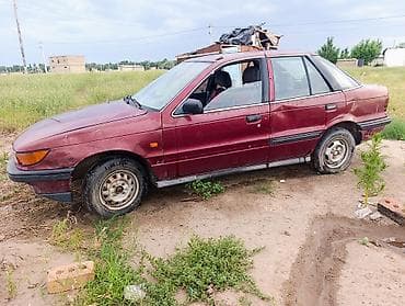 1992: Марка: Mitsubishi Модель: Lancer Год: 1992 Кузов: седан Цвет: вишнёвый — 5
