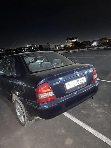bmb 5: Mazda 323: 1999 г., 1.6 л, Механика, Бензин, Седан — 4