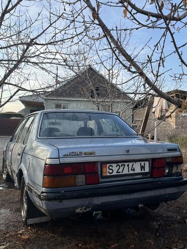 домкрат мазда: Mazda 626: 1985 г., 2 л, Механика, Бензиновая, Седан — 5