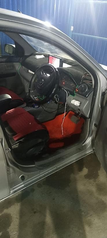 Mazda Demio: 2004 г., Автомат, Бензин, Хэтчбэк — 6