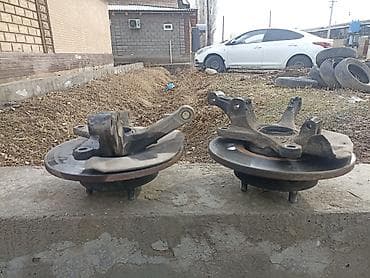 Поворотные кулаки в сборе с тормозными дисками и ступицами (пара) на lalafo.kg да Поворотные кулаки в сборе с тормозными дисками и ступицами (пара) на