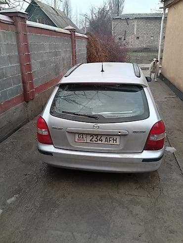 x5 e53: Mazda 323: 2000 г., 1.5 л, Механика, Бензин, Универсал — 3