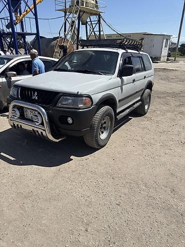 л300 делика: Mitsubishi Montero Sport: 2002 г., 3 л, Автомат, Бензин, Внедорожник — 1