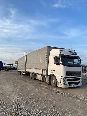 Транспорт: Тягач, Volvo, 2012 г., Тентованный — 3