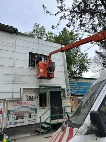 Жарнама, печать: Мытьё окон альпинистами в Бишкеке. Высота не имеет значения - — 2