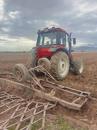 Фронтальные КУНы: Трактор колесный, кабина с остеклением по периметру и рабочей — 4