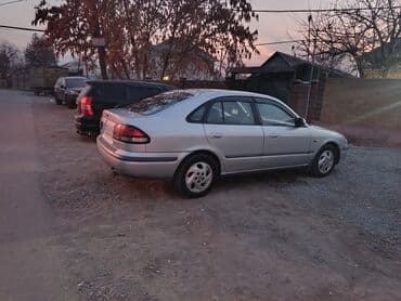 срочно продаю в связи с переездом: Mazda 626: 2000 г., 1.8 л, Механика, Бензин, Хетчбек — 16
