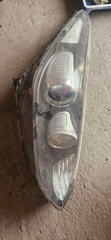 капот на аккорд: Передняя левая фара Kia — 1