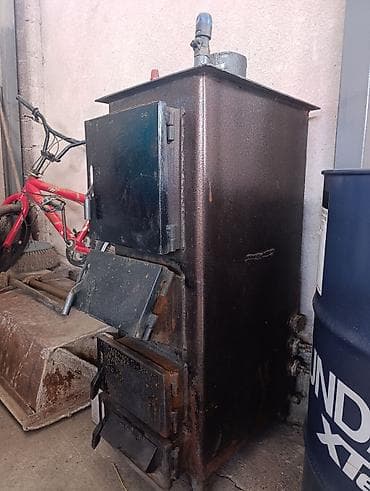 зол: Твердотопливный котёл Для дома, Тип управления: Механический — 2