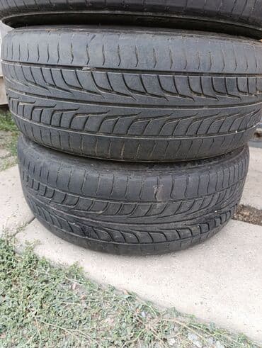 новые шыны: R-18 -215-45. Привозные из Японии. Шины летние комплект 4 шт. По нашим — 2